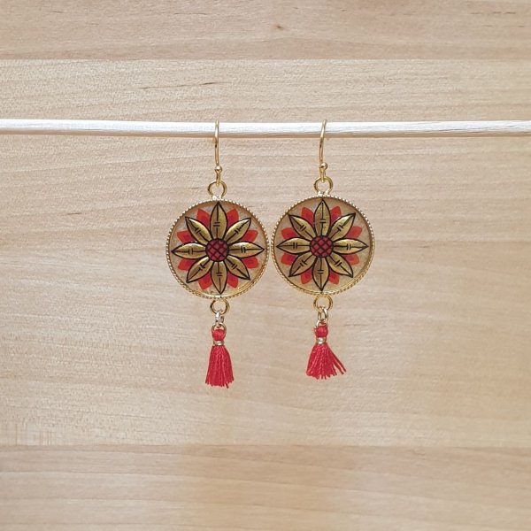 H&auml;ngende Ohrringe mit illuminierter goldener/blauer Blume