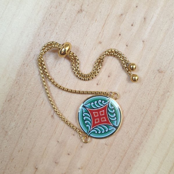 Bracelet r&eacute;glable enluminure motif v&eacute;g&eacute;tal m&eacute;di&eacute;val