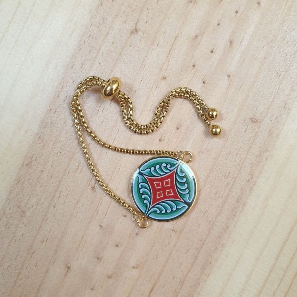 Bracelet r&eacute;glable enluminure motif v&eacute;g&eacute;tal m&eacute;di&eacute;val