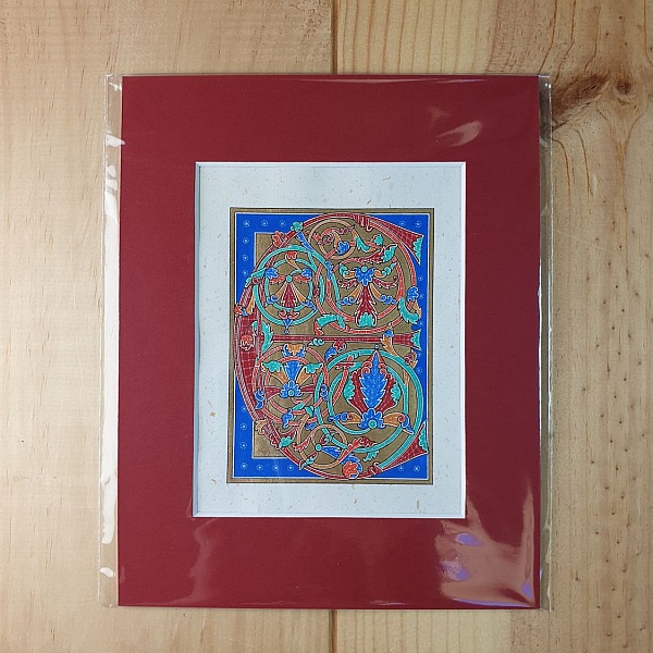 Lettre E enluminée dans un style gothique médiéval décoratif.