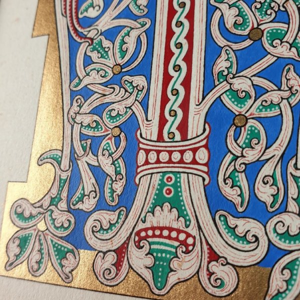 Illuminierter M-Brief im romanischen Stil